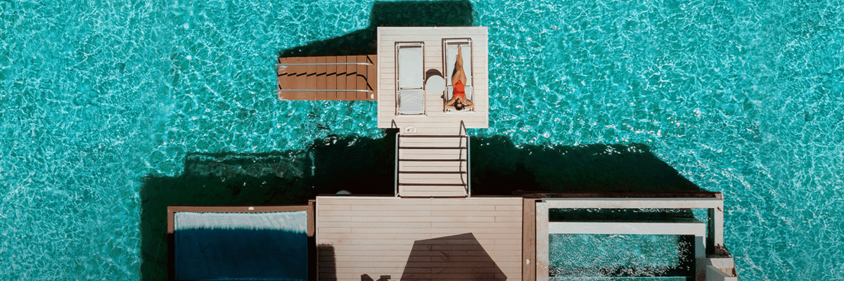 Save up to $1,250 + a Free Catamaran Cruise at any Sandals Resort in Jamaica - background banner